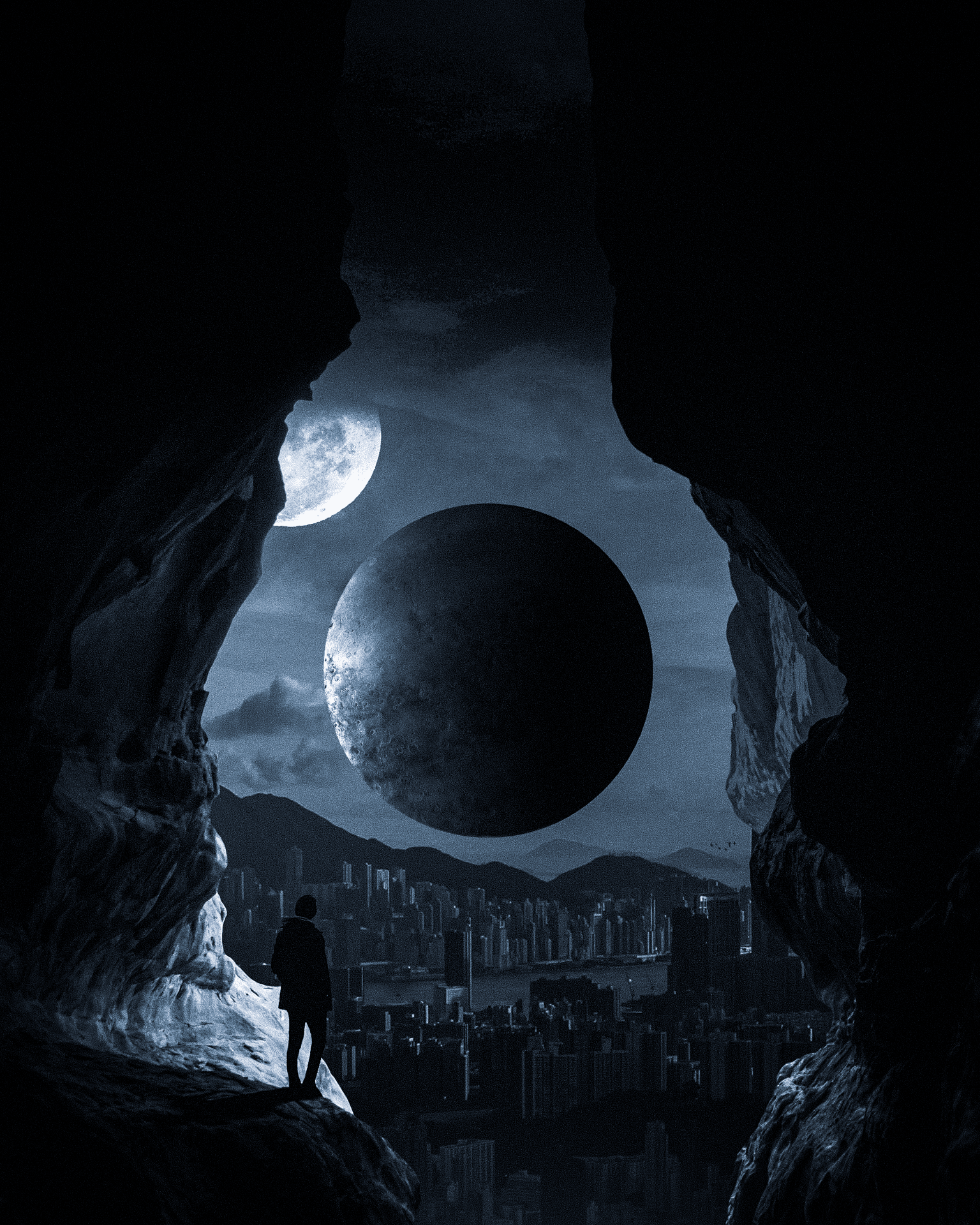 An artwork showing a dark moon very close to Earth. A human figure looks at the moon from the mountains.